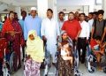 রৌমারীতে অসহায় প্রতিবন্ধী পঙ্গু মানুষের মাঝে হুইলচেয়ার চেয়ার বিতরণ। 