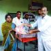 রৌমারীতে শারদীয় দুর্গাপূজা উপলক্ষে হিন্দু সম্প্রদায়ের মাঝে কাপড় বিতরণ। 